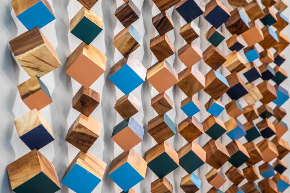 Close up of hanging cube wall art in Longleaf common space