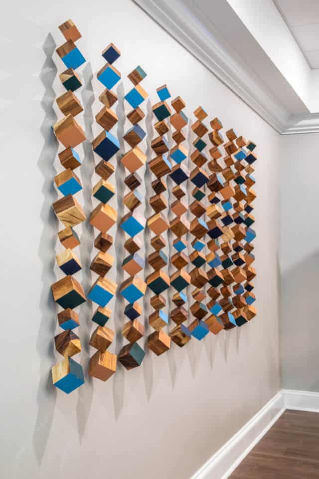 Hanging cube wall art in Longleaf common space