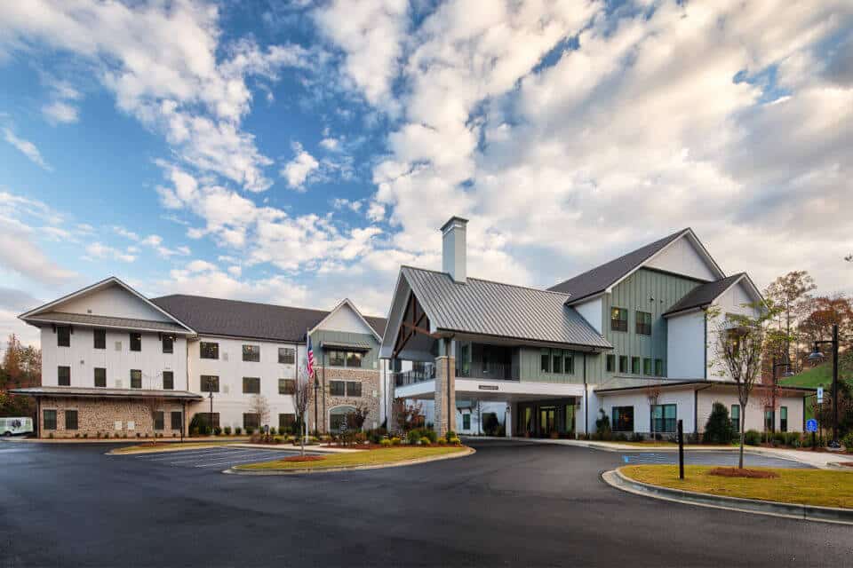 exterior view of Longleaf Liberty Park at daytime with blue skies and white clouds