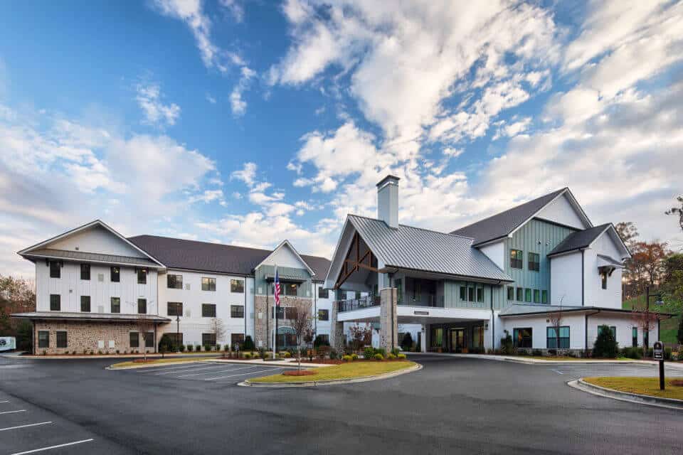 Exterior view of Longleaf Liberty Park at daytime with blue skies and white clouds